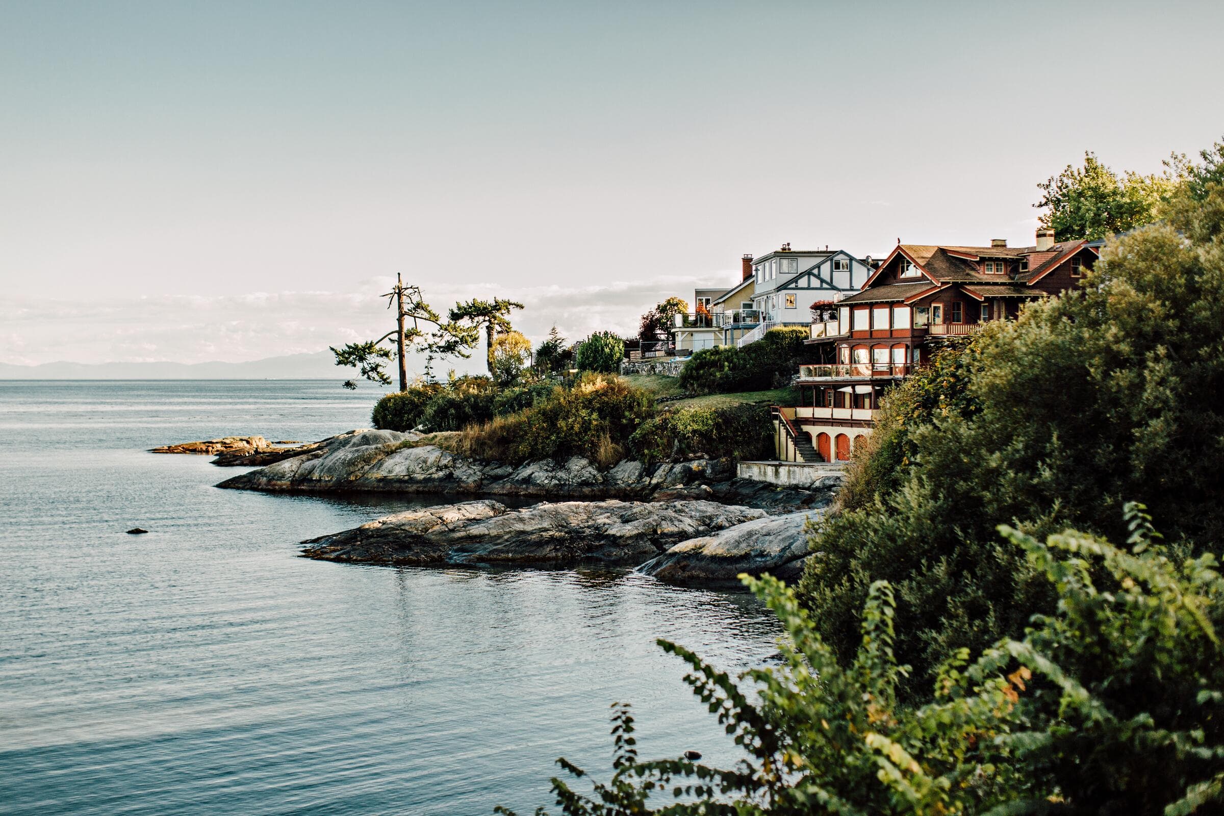 The rocky shoreline near Gonzales Beach in Victoria, looking out over the strait