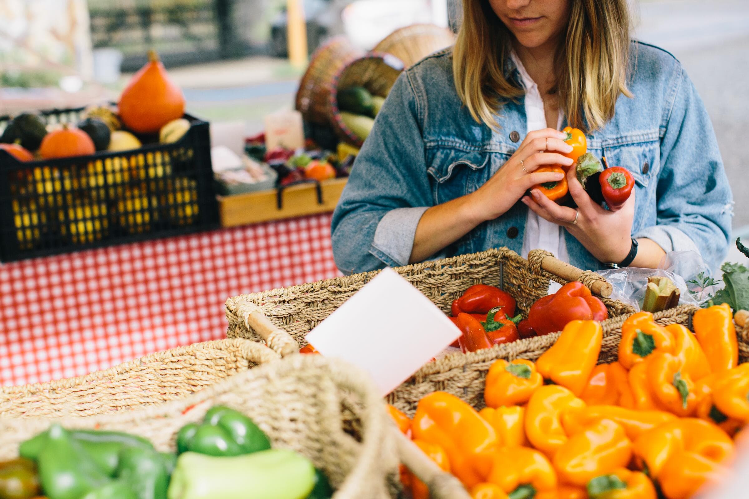 Peppers and squash on a farmers market stall in the Cowichan Valley